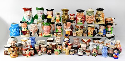 Lot 246 - A collection of Toby and character jugs to...