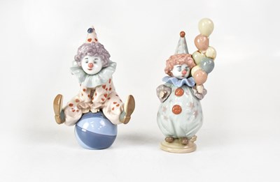 Lot 190 - LLADRÓ; two porcelain clowns, height of...