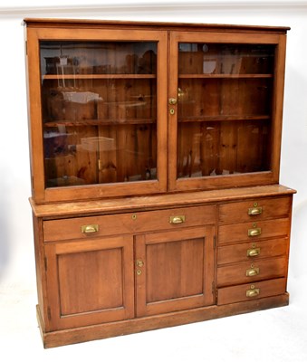 Lot 57 - A mid-20th century pitch pine side cabinet,...