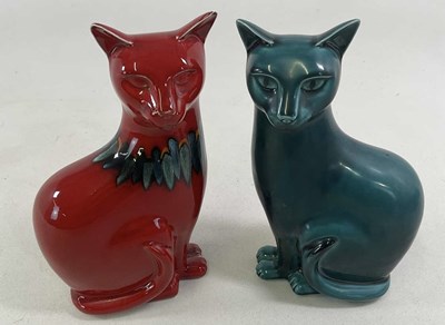 Lot 323 - POOLE POTTERY; a pair of green and red glazed...