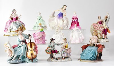 Lot 205 - A collection of ceramic figures to include...