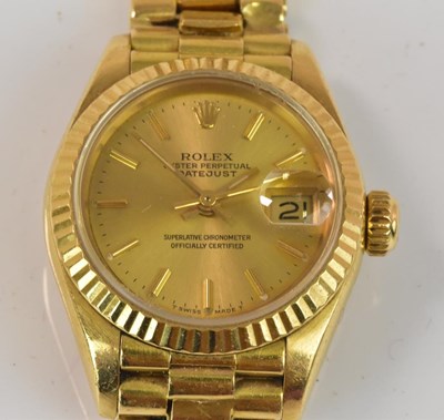 Lot 657 - ROLEX; a lady's 18ct yellow gold Oyster...