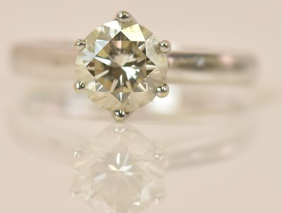 Lot 574 - An 18ct white gold diamond solitaire ring, the...