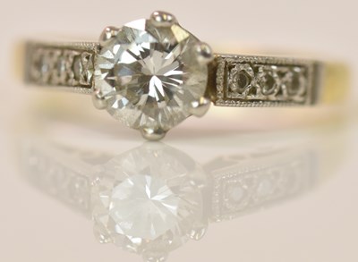 Lot 587 - An 18ct yellow gold diamond solitaire ring,...