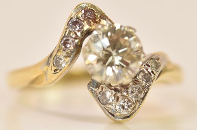 Lot 584 - An 18ct yellow gold and diamond solitaire ring,...