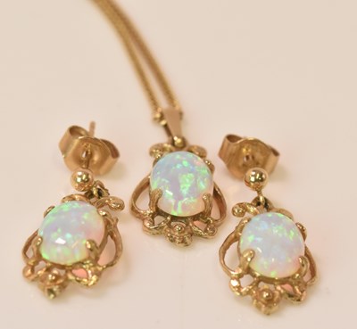 Lot 588 - A suite of 9ct yellow gold and opal jewellery...