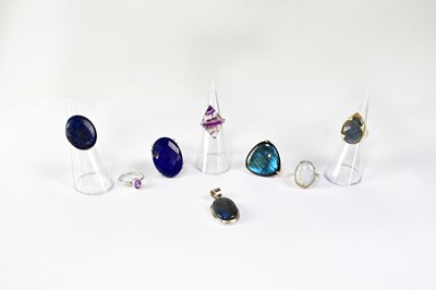 Lot 943 - Seven gemstone set rings, comprising examples...