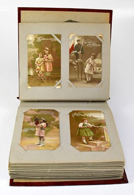 Lot 648 - An album containing a collection of vintage...