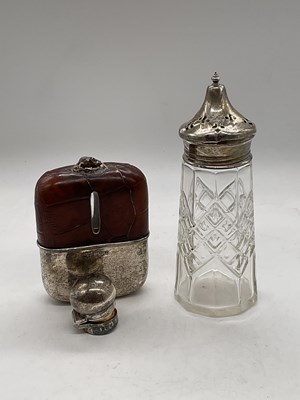 Lot 561 - A badly damaged silver mounted clear glass and...