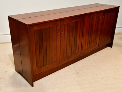 Lot 68 - A mid century teak sideboard, with four...