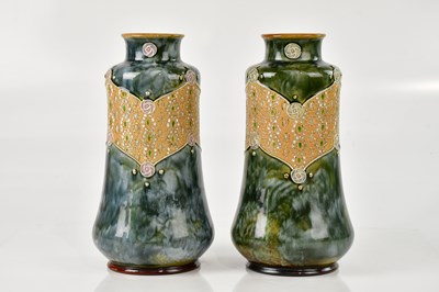 Lot 2 - ROYAL DOULTON; a near pair of Arts & Crafts...