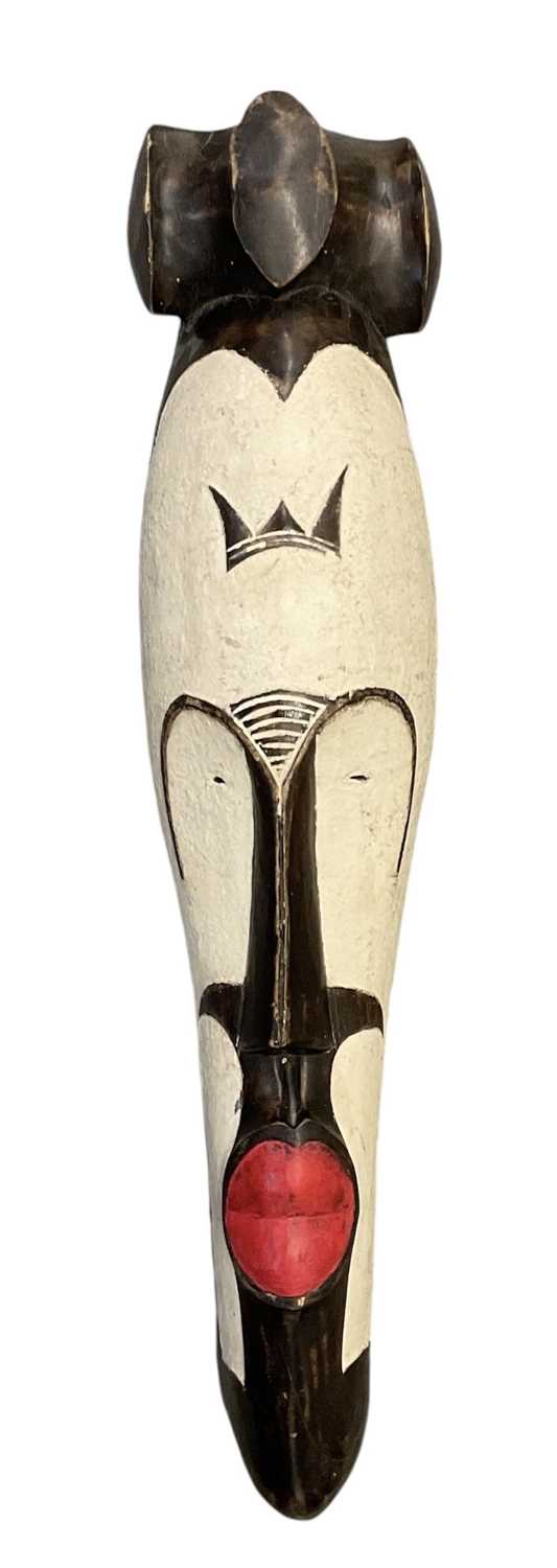 Lot 1079 - An African carved wooden Fang Ngil mask with...