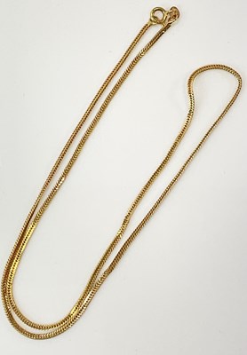 Lot 603 - An 18ct yellow gold box link chain, length...