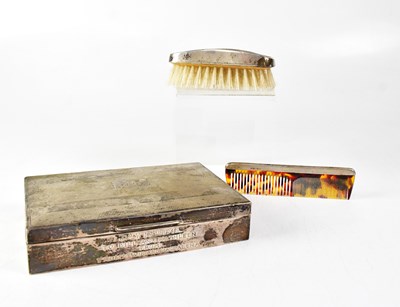 Lot 727 - A cased set of silver-backed brush and comb,...