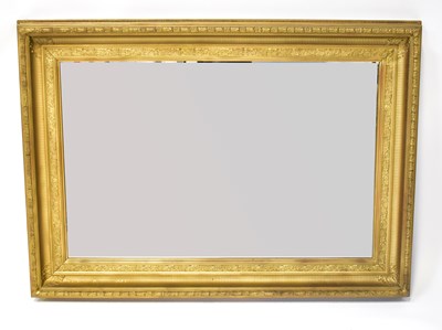 Lot 135 - A gilt framed wall mirror with rectangular...