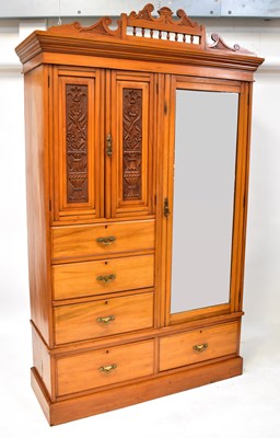 Lot 64 - An Edwardian satinwood Compactum wardrobe with...