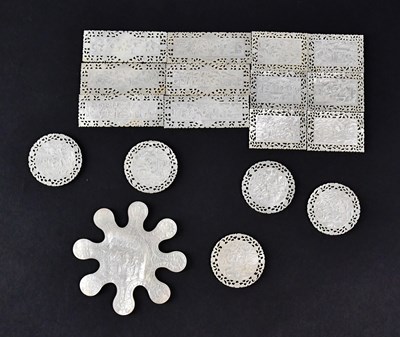 Lot 358 - A quantity of mother-of-pearl gaming counters,...