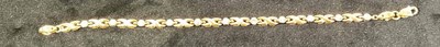 Lot 635 - A 9ct yellow gold bracelet, length 15cm,...