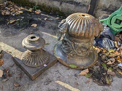 Lot 259 - A cast metal urn and stand (af).