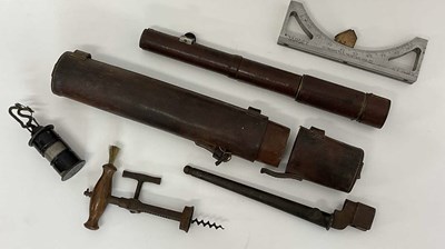 Lot 8 - A leather clad brass bodied telescope 'Davon...