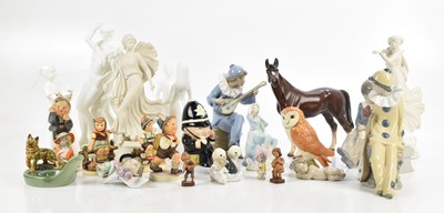 Lot 461 - A collection of ceramic figures including Nao,...