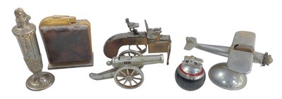 Lot 354 - A collection of six assorted novelty lighters...