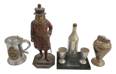 Lot 342 - Four novelty table lighters comprising a...