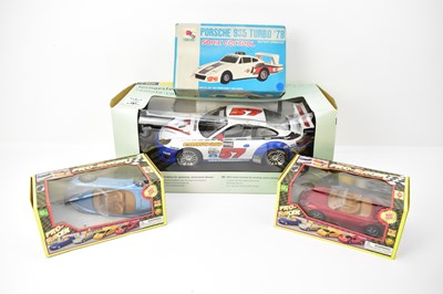 Lot 659 - PORSCHE; four remote and sonic controlled cars,...