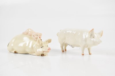 Lot 486 - BESWICK; two figures, one of a pig, the other...