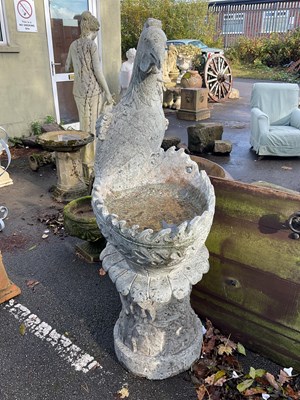 Lot 251 - An Oriental style soapstone figural birdbath...