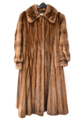 Lot 385 - A full-length mink coat, with wide collar and...