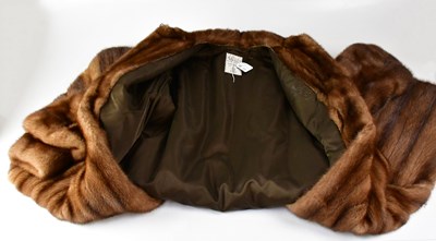 Lot 385 - A full-length mink coat, with wide collar and...