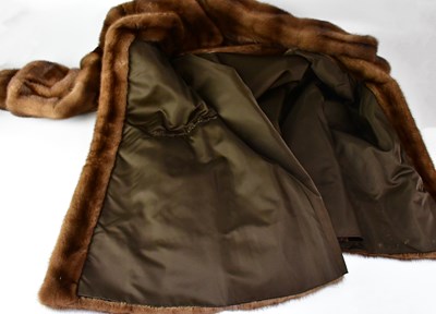 Lot 385 - A full-length mink coat, with wide collar and...