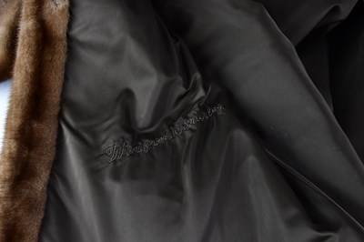 Lot 385 - A full-length mink coat, with wide collar and...