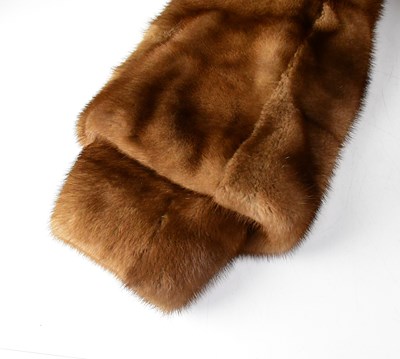Lot 385 - A full-length mink coat, with wide collar and...