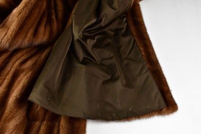 Lot 385 - A full-length mink coat, with wide collar and...
