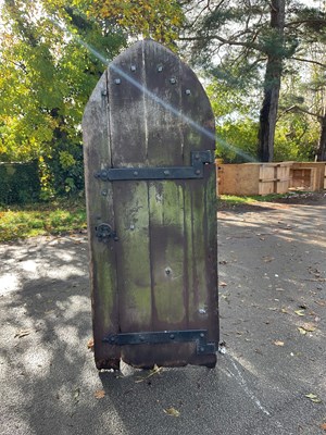 Lot 254 - A heavy wood and iron door, height 190cm.