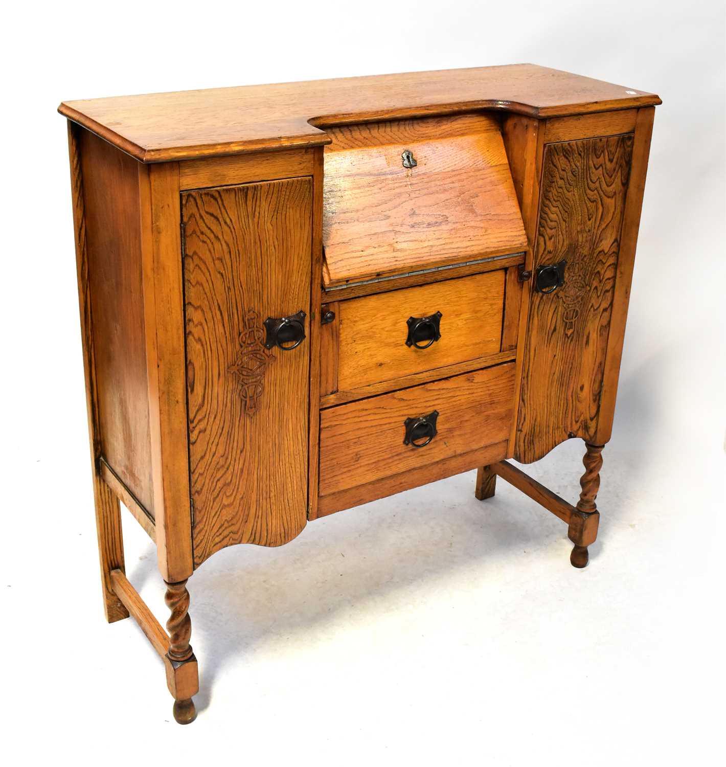 Lot 24 - An early 20th century oak side-by-side bureau,...