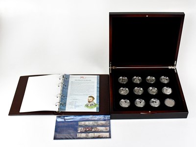 Lot 804 - ROYAL MINT; a part set of twelve 925 silver £5...