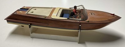 Lot 184 - A remote control speedboat, in the style of a...