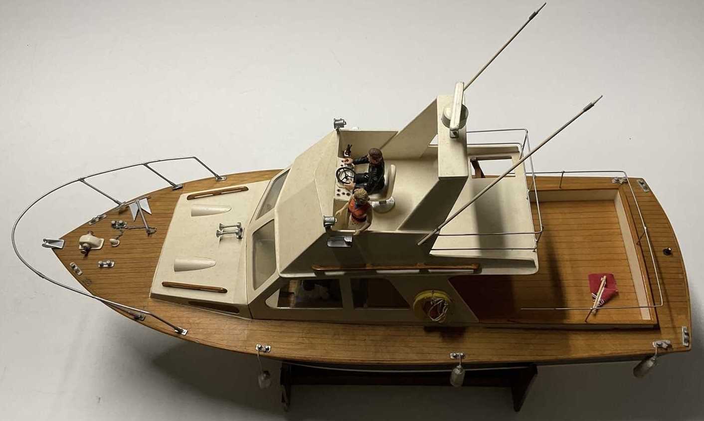 Lot 187 - A remote control motor launch, length 90cm,