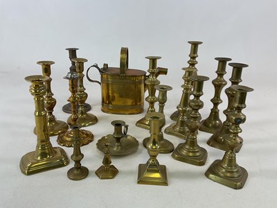 Lot 225 - A collection of brass candlesticks, a chamber...