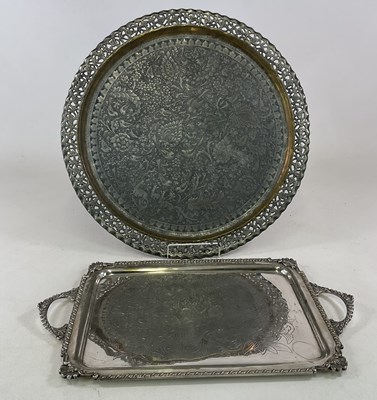 Lot 224 - A large circular Eastern embossed tray...