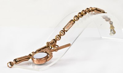 Lot 862 - A 10ct rose gold swivel fob set with a...