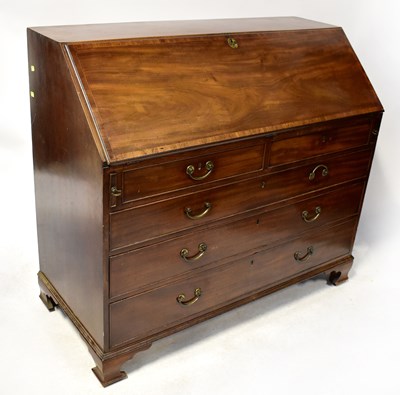 Lot 71 - A George III mahogany fall-front bureau with...