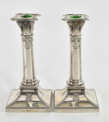 Lot 27 - GOLDSMITHS & SILVERSMITHS; a pair of George V...