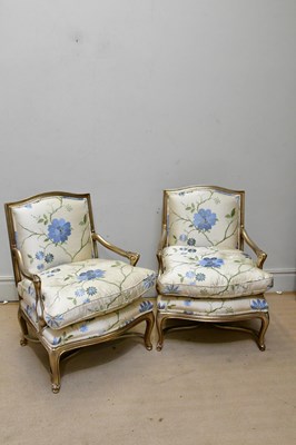 Lot 7 - A pair of modern French style silvered gilt...