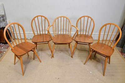 Lot 62 - ERCOL; four elm spindle back Windsor chairs...