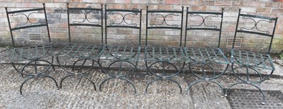 Lot 104B - A set of six painted wrought iron X-framed...