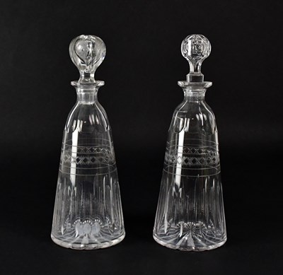 Lot 303 - Two cut glass decanters with band of etched...